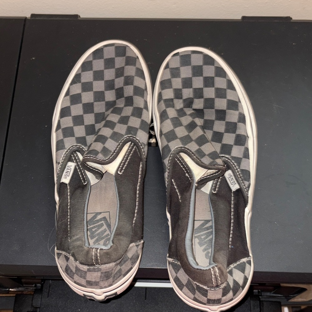 Vans Slip-On Canvas Sneakers in Black and Tan